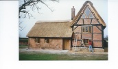 Thatched insurance rebuild project